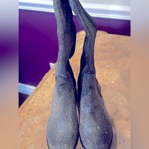 Sparkly silver boot.